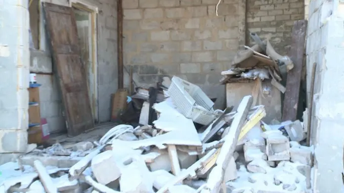 Zničené domy na Ukrajině