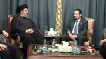 Vůdce Hizballáhu Sajíd Nasralláh a lídr sunnitů Saad Harírí