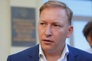 Kandidát na běloruského prezidenta Dzmitryjev si má odpykat 18 měsíců ve vězení