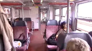 Cestující ve vlaku