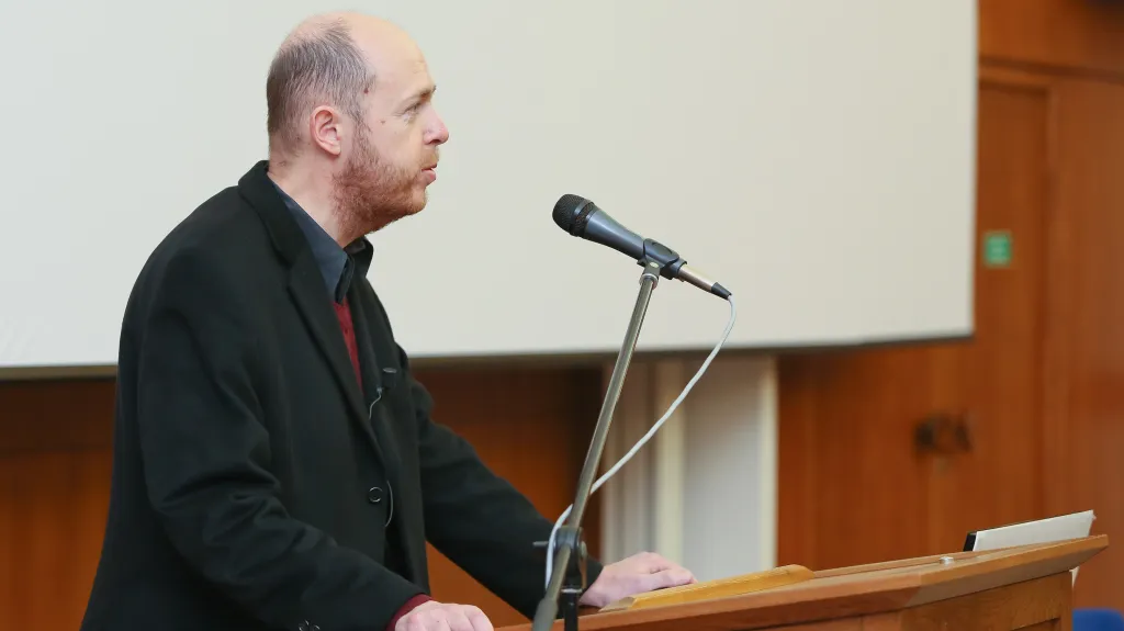 Martin C. Putna během přednášky na UK
