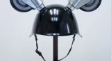 Marek Schovánek / Shopping cart wheels on army helmet