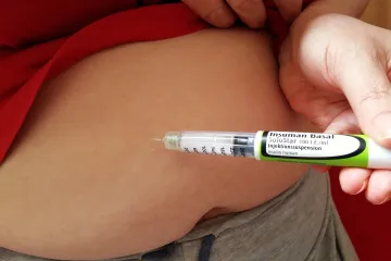 Obezita může zhoršit účinnost očkování proti covidu-19, obávají se vědci
