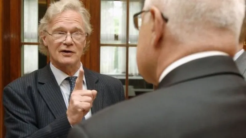 Britský novinář Christopher Booker (vlevo)