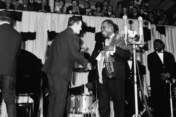Louis Armstrong v Československu budil senzaci, zazpíval mu jeho imitátor