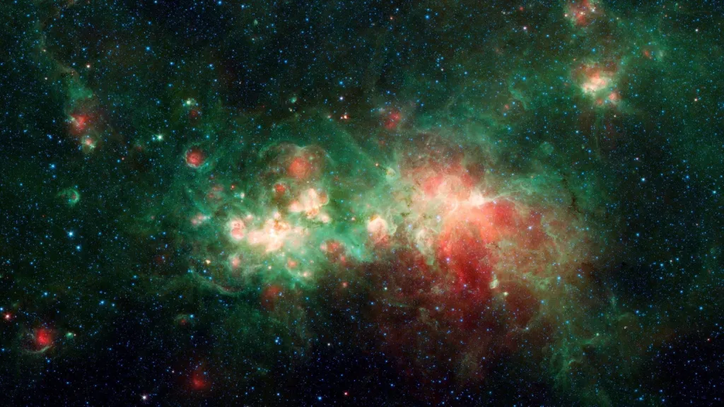 Spitzerův kosmický dalekohled zachytil mlhovinu W51 v souhvězdí Aquila, která je jednou z největších „hvězdných továren“ v Mléčné dráze