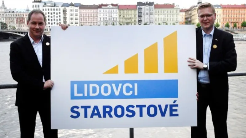 Petr Gazdík a Pavel Bělobrádek představují nové logo,  Autor: Michal Krumphanzl,  Zdroj: ČTK