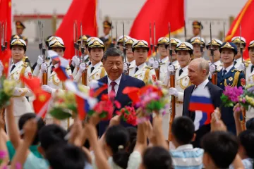 Si a Putin jednají v Pekingu