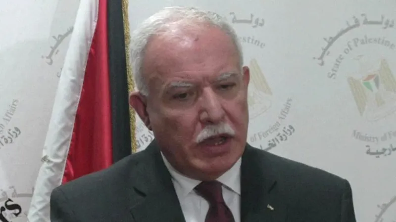 Rijád Málikí v Praze