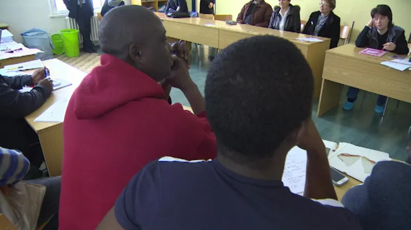 Obyvatelé střediska pro uprchlíky