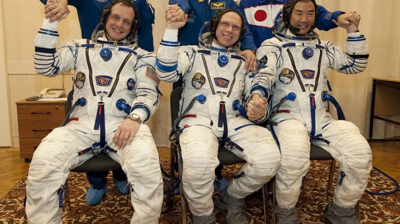 Timothy Creamer, Oleg Kotov, Soiči Noguči (zleva)