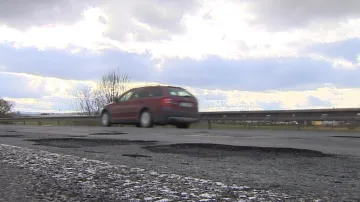 Výmoly na silnicích