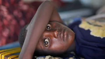 Súdánský pacient s cholerou na provizorní klinice provozované Organizací spojených národů v severním Dárfúru