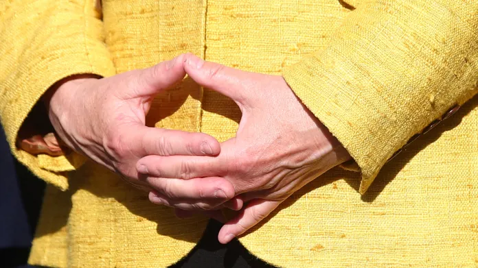 Typické gesto Angely Merkelové