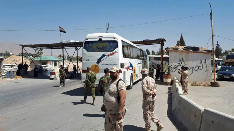 Evakuace povstalců ze syrské Ghúty