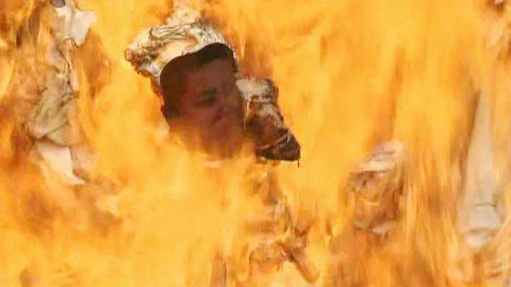 Hořící podobizna Kim Čong-una