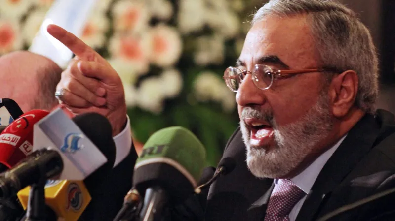 Ministr informací Umrán Zuhbí na tiskové konferenci