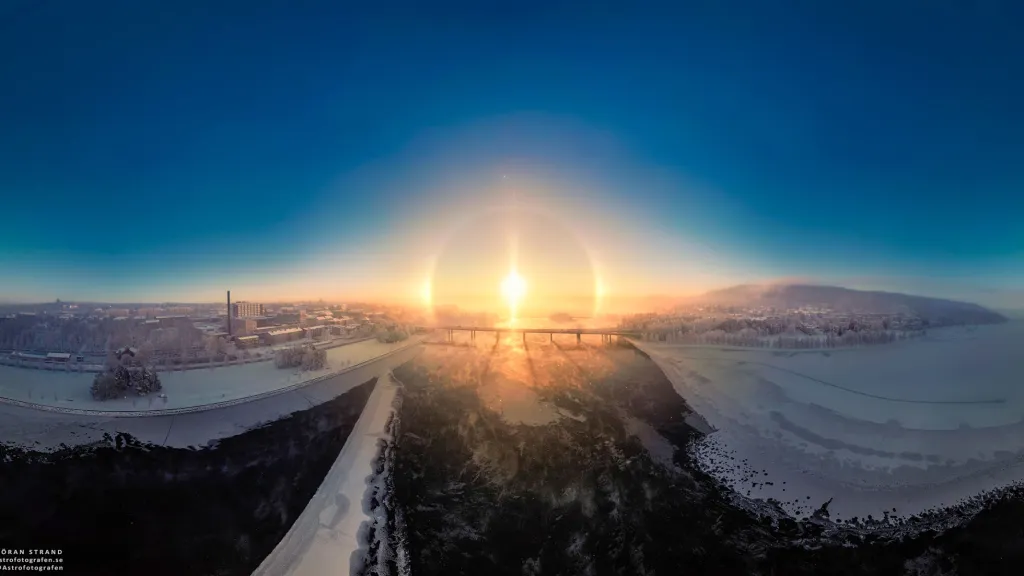 Slunce těsně nad obzorem ve Švédsku