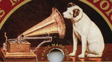 Pes poslouchá gramofon