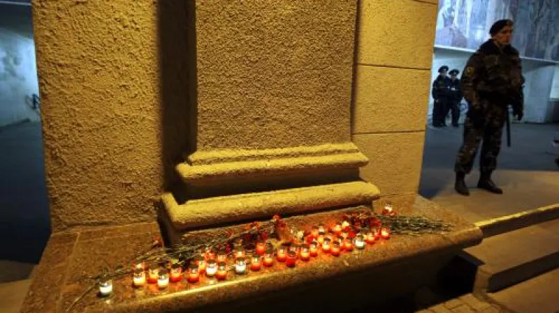 Svíčky u minské stanice metra Okťabrskaja