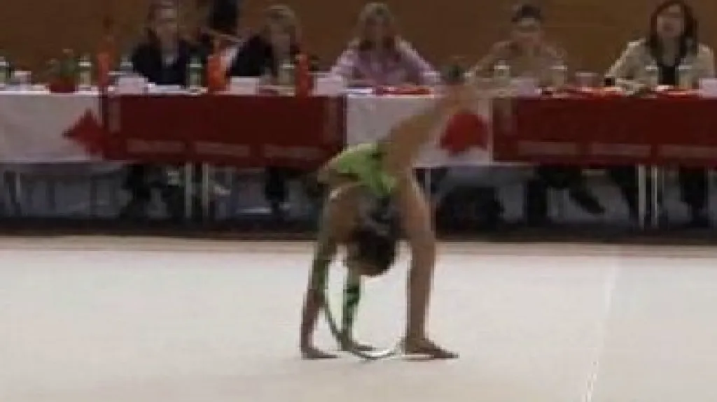 Gymnastka při soutěžním vystoupení
