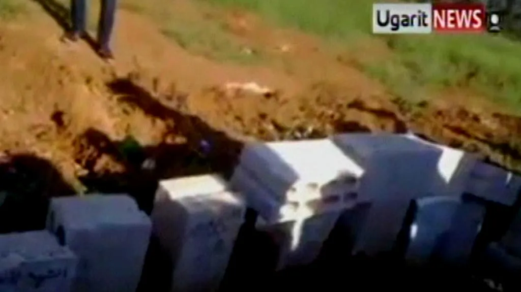 Masový hrob v Sýrii
