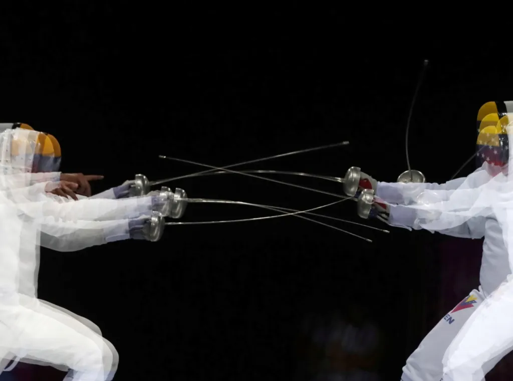 Zajímavý snímek s mnohonásobnou expozicí vznikl na Panamerických hrách v Limě. Celý obraz je umocněný o příběh dvou bratrů Rubéna a Jesúse Limardů, kteří se proti sobě postavili v souboji o zlatou medaili