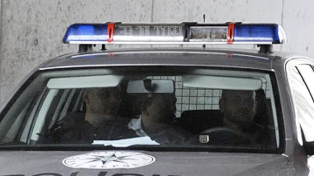 Marek Šnajdr v policejním autě