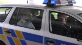 Petr Tluchoř v policejním autě