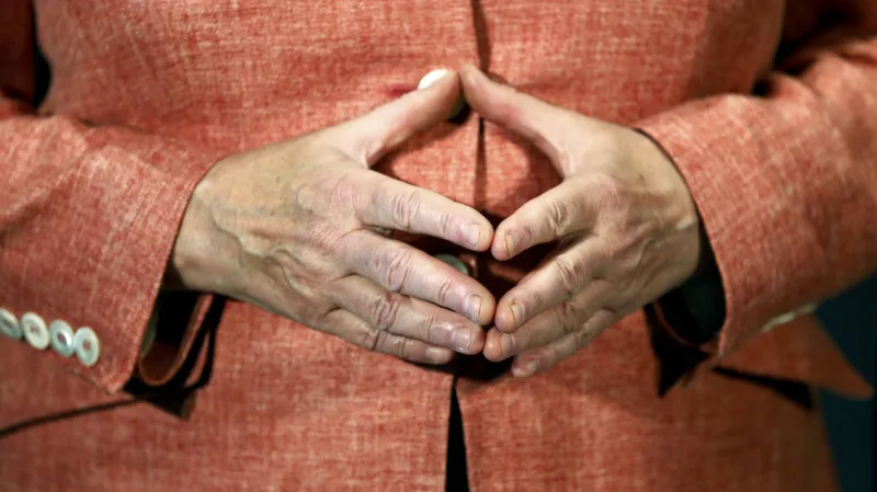 Typické gesto Angely Merkelové