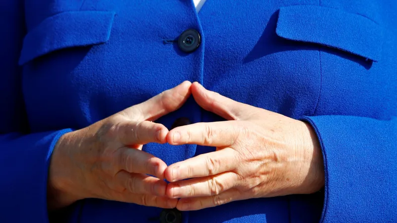 Ikonické gesto kancléřky Merkelové