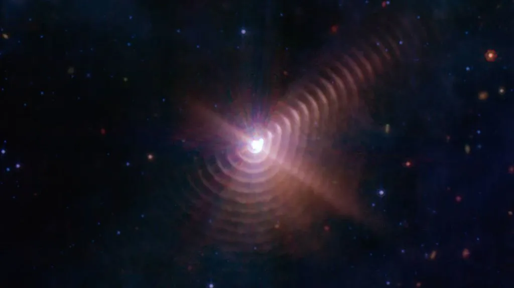 Prachové prstence dvojhvězdy WR 140 na snímku Webbova teleskopu