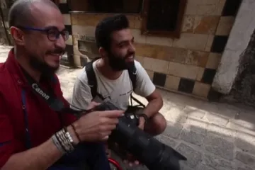 Příběh dvou handicapovaných, kteří se stali fotografy. OSN pomáhá postiženým Syřanům v návratu do života
