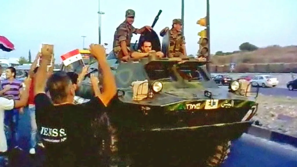 Syrská armáda slaví konec bojů o Latákíji