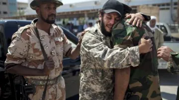 Libyjští povstalci oplakávají své oběti