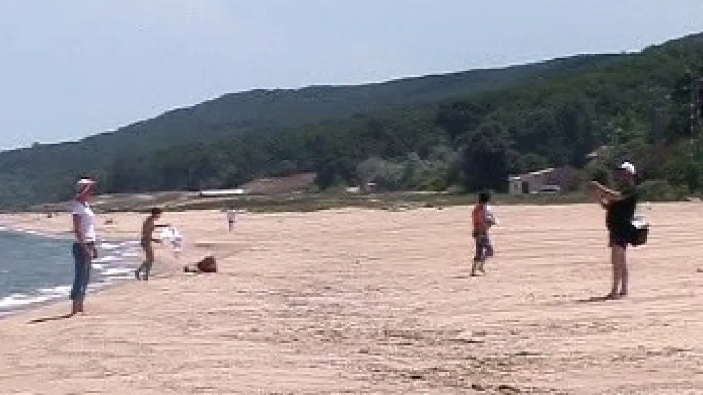 Turisté na dovolené u moře