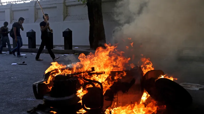 Střety mezi stoupenci a odpůrci Mursího provázely násilnosti