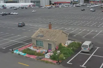 Hřebíkové domy stojí v Číně jako vzpoura proti developerům