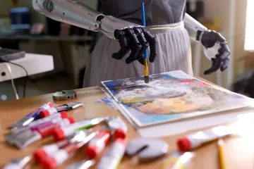 Týden obrazem: Párky na lávě, povodňová svatba a humanoidní robot malířem 