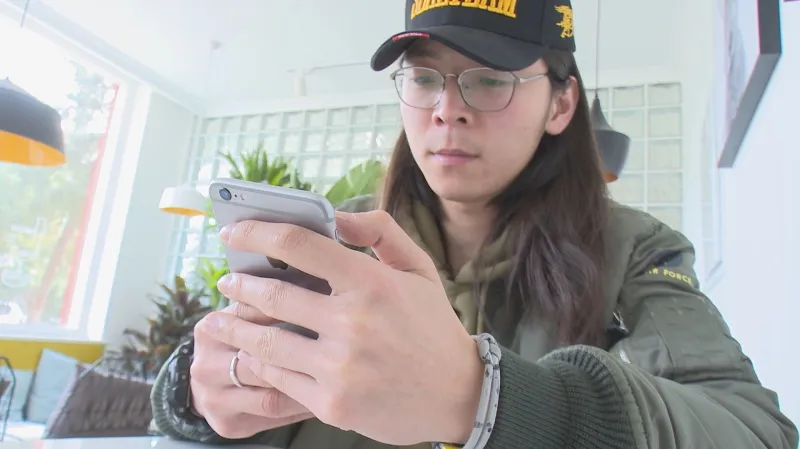 Student Cchuej Ang si funkci sociálního kreditu pochvaluje