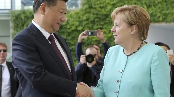 Si Ťin-pching a Angela Merkelová