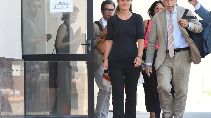 Racketeová se svým právníkem Alessandrem Gamberinim