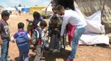 David Chrištof s dětmi syrských uprchlíků