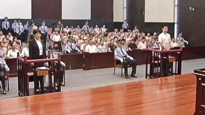 Ku Kchaj-laj a Čang Siao-ťün před soudem