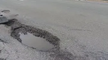 Poškozená silnice