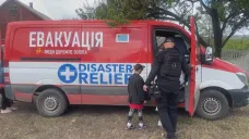 Ukrajinská rodina utíká před válkou