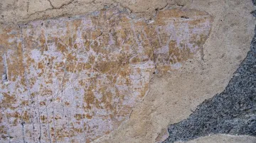 Nápis na zdi v pompejské uličce