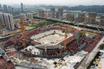 Čínský realitní gigant v potížích Evergrande prodá část aktiv státnímu správci