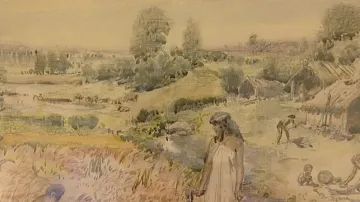 Burian ve skice vyměnil tradiční role. Žena drží sekyru, muž mele obilí