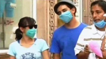 Roušky chrání před prasečí chřipkou